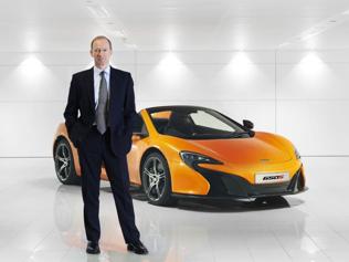 McLaren-Automotive-CEO-Mike-Flewitt-poses-with-the-650S-Photo-AFP McLaren-Automotive-CEO-Mike-Flewitt-poses-with-the-650S-Photo-AFP