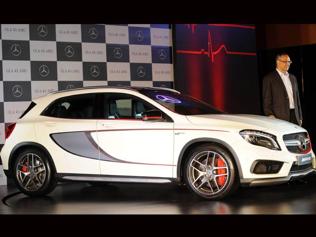 Mercedes-Benz-India-Managing-Director-Eberhard-Kern-poses-with-the-new-GLA45-AMG-4Matic-car-during-its-launch-in-Mumbai-on-October-27-2014-The-GLA45-AMG-4Matic-is-the-eigth-car-from-the-AMG-segment-that-is-now-available-to-Indian-customers-Photo-AFP Mercedes-Benz-India-Managing-Director-Eberhard-Kern-poses-with-the-new-GLA45-AMG-4Matic-car-during-its-launch-in-Mumbai-on-October-27-2014-The-GLA45-AMG-4Matic-is-the-eigth-car-from-the-AMG-segment-that-is-now-available-to-Indian-customers-Photo-AFP