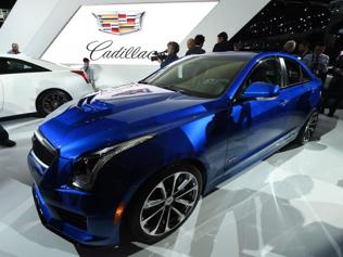 The-Cadillac-2016-ATS-V-coupe-and-sedan-make-their-world-debut-at-the-LA-Auto-Show-Photo-AFP