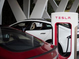 Tesla-Model-S-being-charged-at-a-car-dealership-in-Shanghai-Photo-AFP Tesla-Model-S-being-charged-at-a-car-dealership-in-Shanghai-Photo-AFP