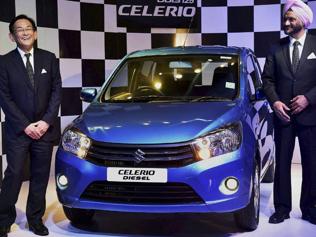 Kenichi-Ayukawa-L-MD-amp-CEO-Maruti-Suzuki-with-R-S-Kalsi-Executive-Director-Marketing-amp-Sales-Maruti-Suzuki-pose-with-company-s-Celerio-diesel-car-during-the-global-launch-of-Suzuki-s-first-diesel-engine-in-New-Delhi-on-Wednesday-Photo-PTI Kenichi-Ayukawa-L-MD-amp-CEO-Maruti-Suzuki-with-R-S-Kalsi-Executive-Director-Marketing-amp-Sales-Maruti-Suzuki-pose-with-company-s-Celerio-diesel-car-during-the-global-launch-of-Suzuki-s-first-diesel-engine-in-New-Delhi-on-Wednesday-Photo-PTI