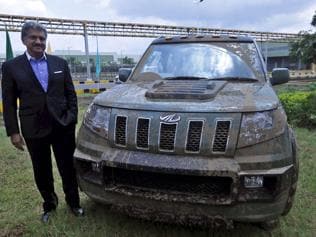 HARDCORE! M&M chairman and MD Anand Mahindra with the new compact SUV TUV300 in Pune on Thursday. Photo:Reuters