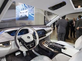 Yanfeng Automotive Interiors (YFAI) displays an autonomous concept car with a retracting steering wheel and seats rotating towards each other for an easier conversation during a press day of the 66th IAA auto show in Frankfurt am Main, western Germany, on September 16, 2015. Photo:AFP