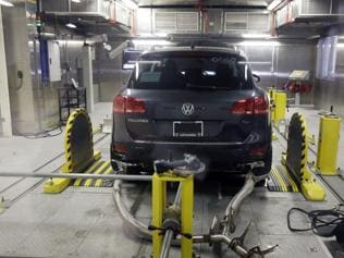 In this October 13, 2015, photo, a Volkswagen Touareg diesel is tested in the Environmental Protection Agency's cold temperature test facility in Ann Arbor, Mich.