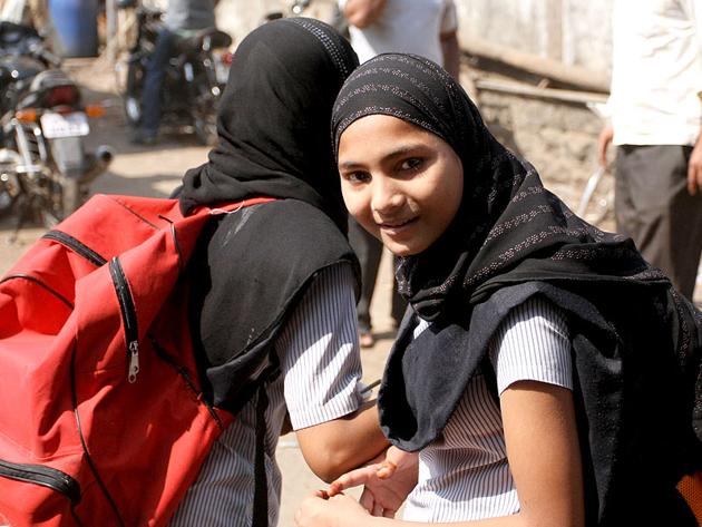 A class 12 board girl student was allegedly misbehaved and scolded while taking her board exam while wearing a hijab. (Shutterstock Photo)