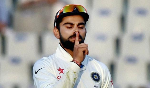 India skipper Virat Kohli silences the rather vocal England cricket fans after the eight-wicket win over the visitors with over a day to spare in the third Test at Mohali on Tuesday, which gave the hosts a 2-0 lead with matches left in Mumbai and Chennai.(PTI)