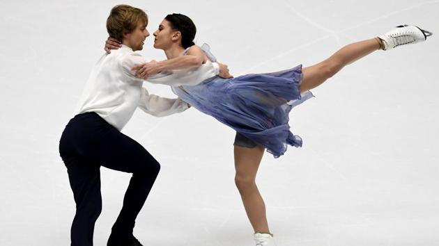 US Kaitlin Hawayek (R) and Jean-Luc Baker perform during the ice dance free dance. (AFP) US Kaitlin Hawayek (R) and Jean-Luc Baker perform during the ice dance free dance. (AFP)