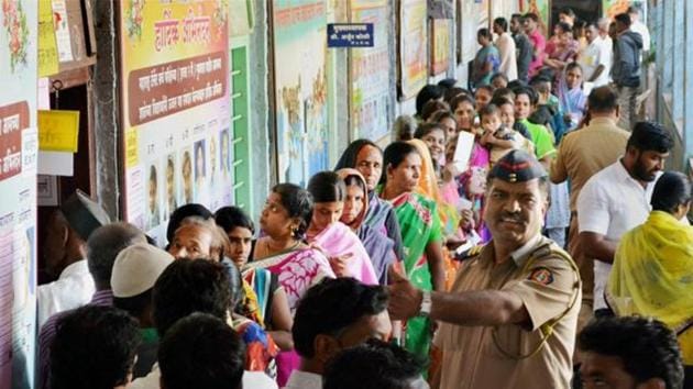 Voters stand in a queue to cast their votes at a polling booth for Municipal Council Elections in Karad, Maharashtra.(PTI Photo) Voters stand in a queue to cast their votes at a polling booth for Municipal Council Elections in Karad, Maharashtra.(PTI Photo)