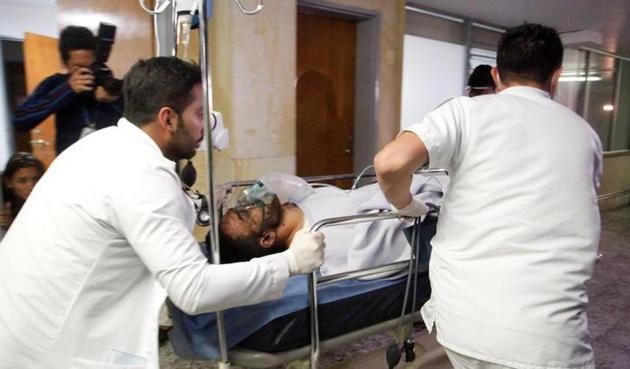 Alan Luciano Ruschel of Chapecoense club receives medical attention after the crash in Antioquia, Colombia.(REUTERS) Alan Luciano Ruschel of Chapecoense club receives medical attention after the crash in Antioquia, Colombia.(REUTERS)