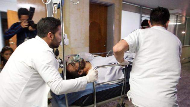 Brazilian soccer player Alan Luciano Ruschel of Chapecoense soccer club receives medical attention after a plane crash in Antioquia, central Colombia. (REUTERS) Brazilian soccer player Alan Luciano Ruschel of Chapecoense soccer club receives medical attention after a plane crash in Antioquia, central Colombia. (REUTERS)