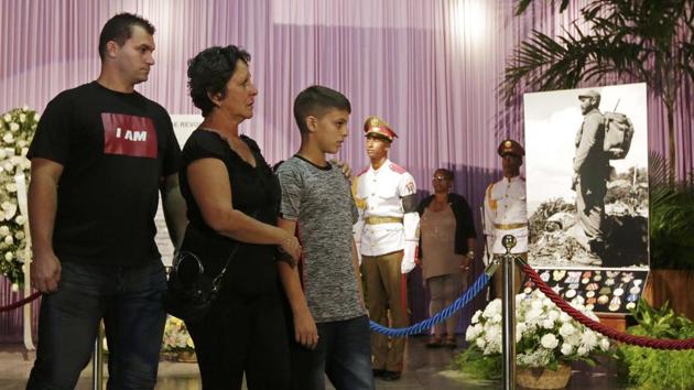 Ten-year-old Marlon Mendez (R), who claims to be an admirer of Cuba's former President Fidel Castro, visits a temporary memorial to Castro in Revolution Square in Havana, Cuba (REUTERS) Ten-year-old Marlon Mendez (R), who claims to be an admirer of Cuba's former President Fidel Castro, visits a temporary memorial to Castro in Revolution Square in Havana, Cuba (REUTERS)