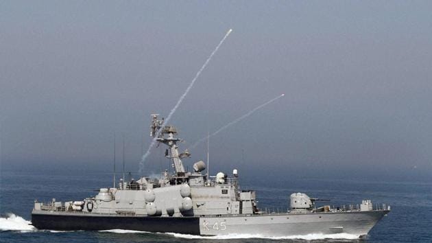 A naval boat during 'Day at Sea' exercise conducted as part of the Navy Day celebrations in Mumbai on Monday. (PTI Photo) 