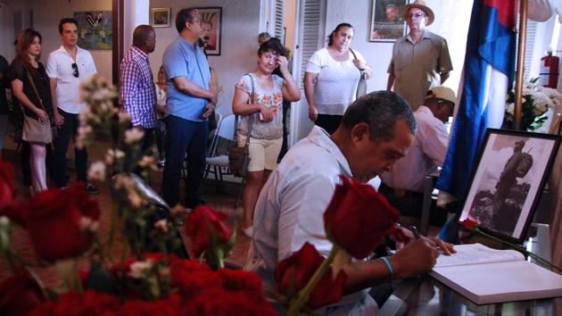 A man signs the condolence book at the Cuban embassy in Panama City on November 28, 2016. Cuban revolutionary icon Fidel Castro died last Friday in Havana, his brother, President Raul Castro, announced on national television. Castro's ashes will be buried in the historic southeastern city of Santiago on December 4 after a four-day procession through the country. (AFP) A man signs the condolence book at the Cuban embassy in Panama City on November 28, 2016. Cuban revolutionary icon Fidel Castro died last Friday in Havana, his brother, President Raul Castro, announced on national television. Castro's ashes will be buried in the historic southeastern city of Santiago on December 4 after a four-day procession through the country. (AFP)