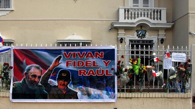 View of the facade of the Cuban embassy in Panama City, where Fidel Castro's followers placed letters, flowers and banners on November 28, 2016. Cuban revolutionary icon Fidel Castro died last Friday in Havana, his brother, President Raul Castro, announced on national television. Castro's ashes will be buried in the historic southeastern city of Santiago on December 4 after a four-day procession through the country. (AFP) View of the facade of the Cuban embassy in Panama City, where Fidel Castro's followers placed letters, flowers and banners on November 28, 2016. Cuban revolutionary icon Fidel Castro died last Friday in Havana, his brother, President Raul Castro, announced on national television. Castro's ashes will be buried in the historic southeastern city of Santiago on December 4 after a four-day procession through the country. (AFP)