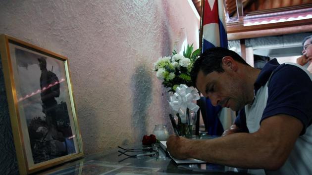 A man signs the condolence book at the Cuban embassy in Panama City on November 28, 2016. Cuban revolutionary icon Fidel Castro died last Friday in Havana, his brother, President Raul Castro, announced on national television. Castro's ashes will be buried in the historic southeastern city of Santiago on December 4 after a four-day procession through the country. (AFP) A man signs the condolence book at the Cuban embassy in Panama City on November 28, 2016. Cuban revolutionary icon Fidel Castro died last Friday in Havana, his brother, President Raul Castro, announced on national television. Castro's ashes will be buried in the historic southeastern city of Santiago on December 4 after a four-day procession through the country. (AFP)