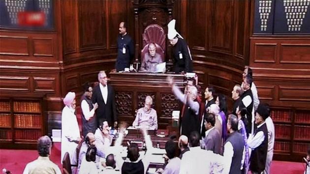 Opposition members holding a protest in the well of Rajya Sabha in New Delhi.(PTI file photo)
