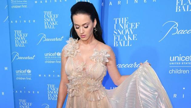 Dressed in a nude gown with flowery motifs, she looked ethereal on the red carpet. (AFP)