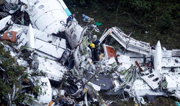 Rescue crew work at the wreckage from a plane that crashed into Colombian jungle with Brazilian soccer team Chapecoense near Medellin, Colombia. (REUTERS) Rescue crew work at the wreckage from a plane that crashed into Colombian jungle with Brazilian soccer team Chapecoense near Medellin, Colombia. (REUTERS)