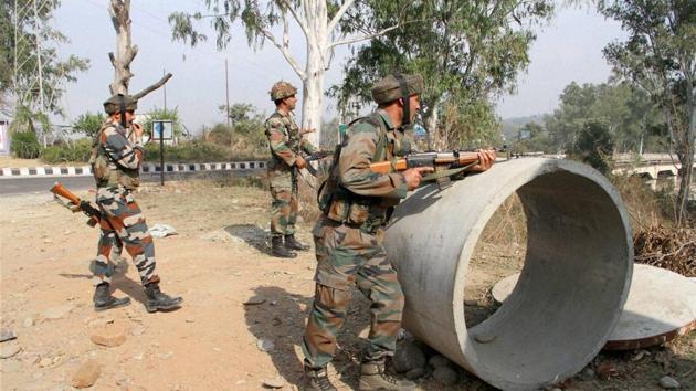Security personnel take positions during a gun battle with militants at an army camp in Nagrota. (PTI Photo) Security personnel take positions during a gun battle with militants at an army camp in Nagrota. (PTI Photo)