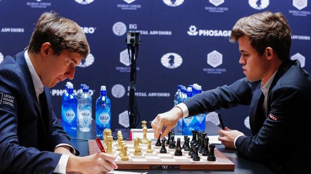Magnus Carlsen has been stretched by Sergey Karjakin in the world chess championship as the contest enters the tie-break stage.(AFP)