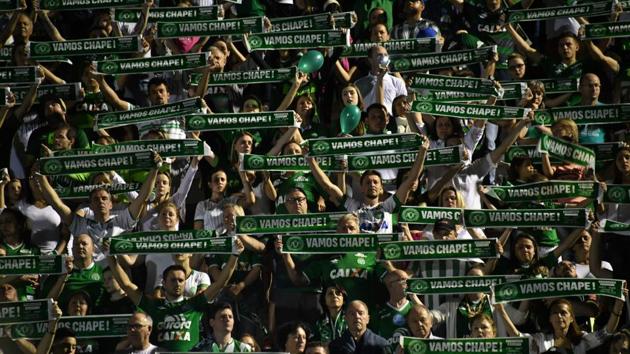 Across the continent, in Brazil, the mood was even more sombre as residents of the small agricultural city of Chapeco gathered in the team’s stadium for a Roman Catholic Mass with relatives of the victims and the players. (Nelson Almeida/AFP)