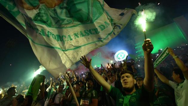 Brazil's Chapecoense football club fans participate in a tribute to the players killed in the plane crash at the club's stadium in Chapeco, Santa Catarina, Brazil, on Wednesday.(AFP)