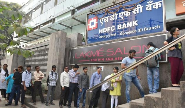 People queue up outside HDFC bank in Goregaon (East) on Thursday. (Pratham Gokhale) People queue up outside HDFC bank in Goregaon (East) on Thursday. (Pratham Gokhale)