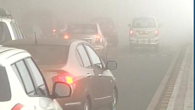 A thick blanket of fog covered Delhi for the second consecutive day, with operations at the city airport being briefly suspended.(ANI Photo) A thick blanket of fog covered Delhi for the second consecutive day, with operations at the city airport being briefly suspended.(ANI Photo)