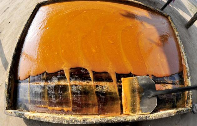 The juice reduced to a concentrate is then cooled and solidified. (Ravi Kumar/HT)