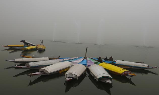 Kashmiri boatmen drink tea in Srinagar. An increase in tourist arrivals will help everybody, from the tourist guide, to boatmen, to travel professionals, make a living. (AP) Kashmiri boatmen drink tea in Srinagar. An increase in tourist arrivals will help everybody, from the tourist guide, to boatmen, to travel professionals, make a living. (AP)