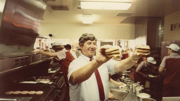 In an undated handout photo, Jim Delligatti holds two Big Mac burgers. (Agencies) In an undated handout photo, Jim Delligatti holds two Big Mac burgers. (Agencies)