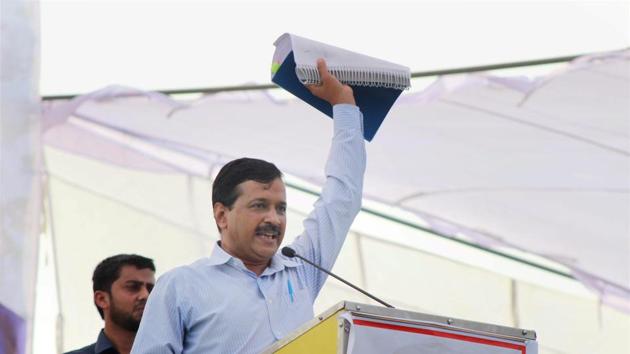 “I will go around the country with these papers and expose the BJP,” Kejriwal said, waving a set of documents containing allegations against the Prime Minister at a rally against demonetisation of currency notes, at Meerut on Thursday. (PTI) “I will go around the country with these papers and expose the BJP,” Kejriwal said, waving a set of documents containing allegations against the Prime Minister at a rally against demonetisation of currency notes, at Meerut on Thursday. (PTI)