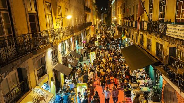 Lisbon took the third spot. Locals spill out into the streets at nightfall in the city. (AFP)