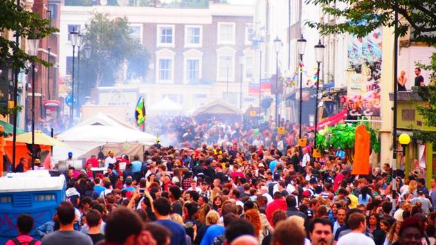 Strangely, one of the most popular choices with tourists, London took the 10th spot. Seen here is the carnival goers at Notting Hill. (AFP)