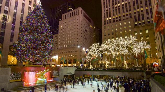 The ever-buzzing New York city was voted fourth. Skaters at Rockefeller Center enjoy a beautiful evening. (AFP)