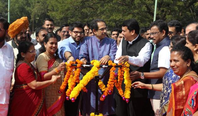 Yuva Sena chief Aaditya Thackeray (second from left), Shiv Sena president Uddhav Thackeray (centre) and CM Devendra Fadnavis inaugurate a water tunnel at Bhandup.(Praful Gangurde)