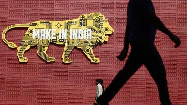 People walk past the logo of 'Make in India' at the venue of the weeklong event in Mumbai, India, Monday, Feb 15, 2016. A massive fire had broken out Sunday night at the event meant to showcase India as an attractive destination for billions of dollars of foreign investment. (AP Photo//Rafiq Maqbool)(AP) People walk past the logo of 'Make in India' at the venue of the weeklong event in Mumbai, India, Monday, Feb 15, 2016. A massive fire had broken out Sunday night at the event meant to showcase India as an attractive destination for billions of dollars of foreign investment. (AP Photo//Rafiq Maqbool)(AP)