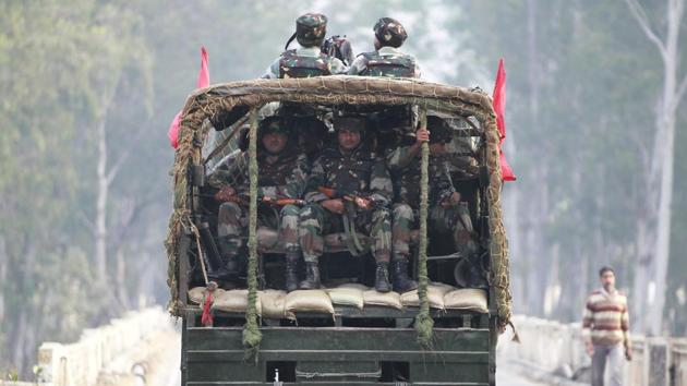 Indian soldiers patrol a highway outside an army base in Nagrota, about 15 kilometers from Jammu, on Wednesday. (AP file photo) Indian soldiers patrol a highway outside an army base in Nagrota, about 15 kilometers from Jammu, on Wednesday. (AP file photo)