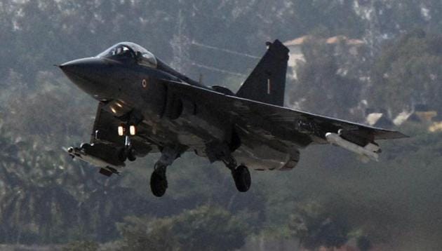 Light Combat Aircraft (LCA) 'Tejas' flies during Initial Operational Clearance before its induction into IAF at Hindustan Aeronautical Ltd airport in Bengaluru.(PTI) Light Combat Aircraft (LCA) 'Tejas' flies during Initial Operational Clearance before its induction into IAF at Hindustan Aeronautical Ltd airport in Bengaluru.(PTI)
