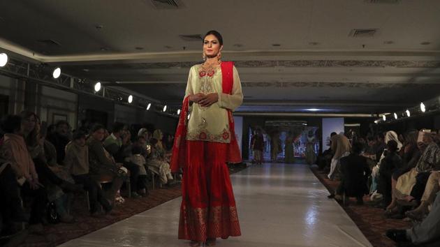 A Model walks the ramp in Peshawar during a fashion show by local designers of label Nauratan. (AP) A Model walks the ramp in Peshawar during a fashion show by local designers of label Nauratan. (AP)