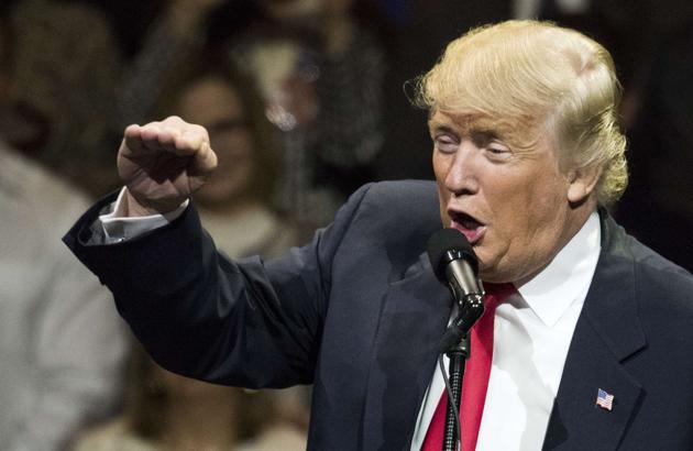 US president-elect Donald Trump hinted on Friday that American companies relocating operations and jobs out of the country would have to face higher duty on their products. (AFP photo) US president-elect Donald Trump hinted on Friday that American companies relocating operations and jobs out of the country would have to face higher duty on their products. (AFP photo)