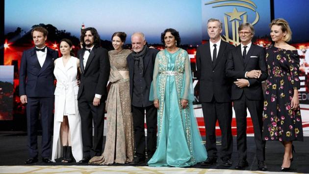Can you spot Kalki Koechlin in this group of international artistes? (L-R) Jury members Jason Clarke, Suzanne Clement, Lisandro Alonso, Kalki Koechlin, jury president Bela Tarr, Fatima Harandi Raouia, Bruno Dumont, Bille August and Jasmine Trinca at the 16th Marrakech International Film Festival’s opening ceremony in Marrakech, Morocco, on Friday. (AP)