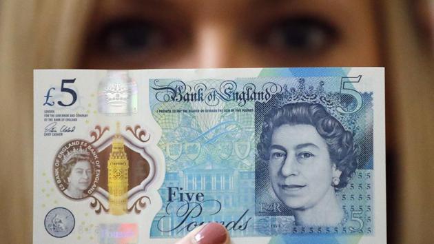 The new £5 polymer note issued by the Bank of England uses tallow as part of its production process, and some temples in Britain were refusing to accept the notes. (Reuters/ AP photo) The new £5 polymer note issued by the Bank of England uses tallow as part of its production process, and some temples in Britain were refusing to accept the notes. (Reuters/ AP photo)