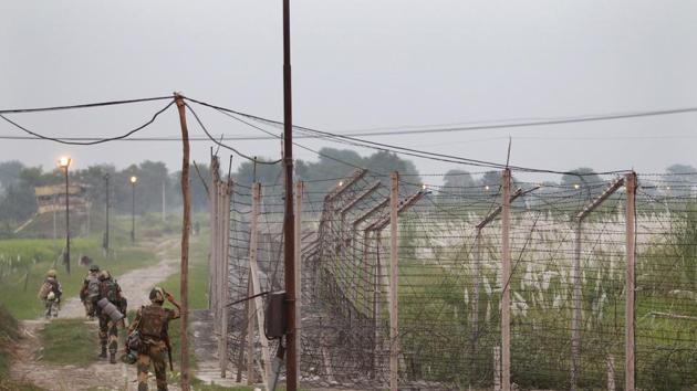 Indian Border Security Force soldiers patrolling near the India-Pakistan international border area in Akhnoor sector. (AP File Photo) Indian Border Security Force soldiers patrolling near the India-Pakistan international border area in Akhnoor sector. (AP File Photo)