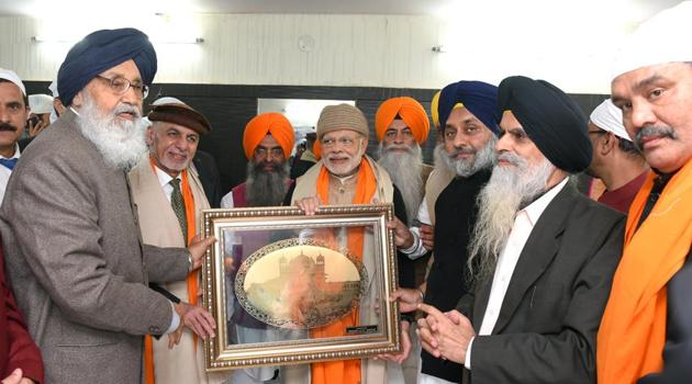 PM Narendra Modi and Afghan president Ashraf Ghani with Punjab CM Parkash Singh Badal, deputy chief minister Sukhbir Singh Badal and Union minister Vijay Sampla Harmandar Sahib (Golden Temple) in Amritsar on Saturday. (Photo: Punjab CMO)