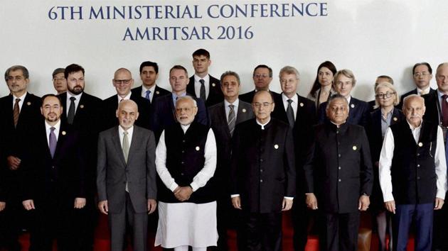 Prime Minister Narendra Modi, along with Afghanistan’s President Ashraf Ghani, finance minister Arun Jaitley and other delegates, poses for a group photo before the inauguration of the 6th Heart of Asia Ministerial Conference.(PTI Photo)