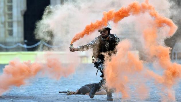 Marine commandos demonstrate rescue operation during Navy Day celebration at Gateway of India. (Pratham Gokhale/HT PHOTO)