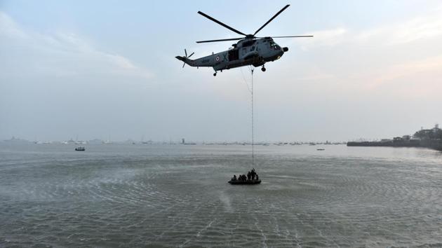 Marine commandos demonstrate rescue operation during Navy Day celebration at Gateway of India in Mumbai. (Pratham Gokhale/HT PHOTO)
