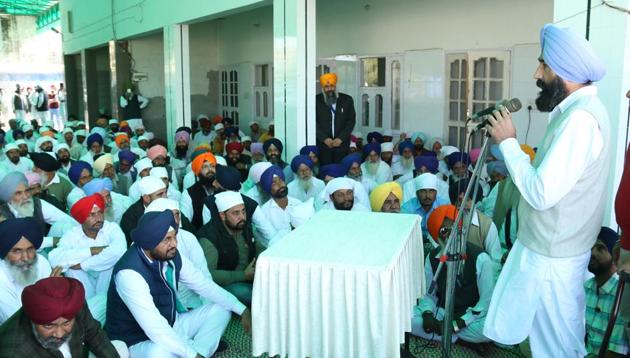 Bathinda (rural) halqa in-charge Gurbinder Singh Banwala addressing a gathering in Bathinda on Saturday.(HT Photo)