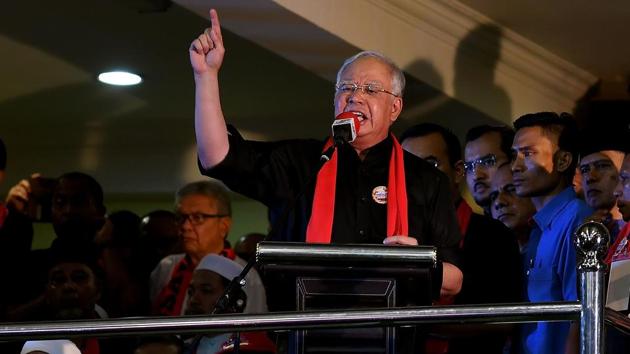 Malaysian Prime Minister Najib Razak gestures while addressing ethnic Rohingya Muslim refugees during a gathering in Kuala Lumpur on Sunday against the persecution of Rohingya Muslims in Myanmar.(AFP) Malaysian Prime Minister Najib Razak gestures while addressing ethnic Rohingya Muslim refugees during a gathering in Kuala Lumpur on Sunday against the persecution of Rohingya Muslims in Myanmar.(AFP)